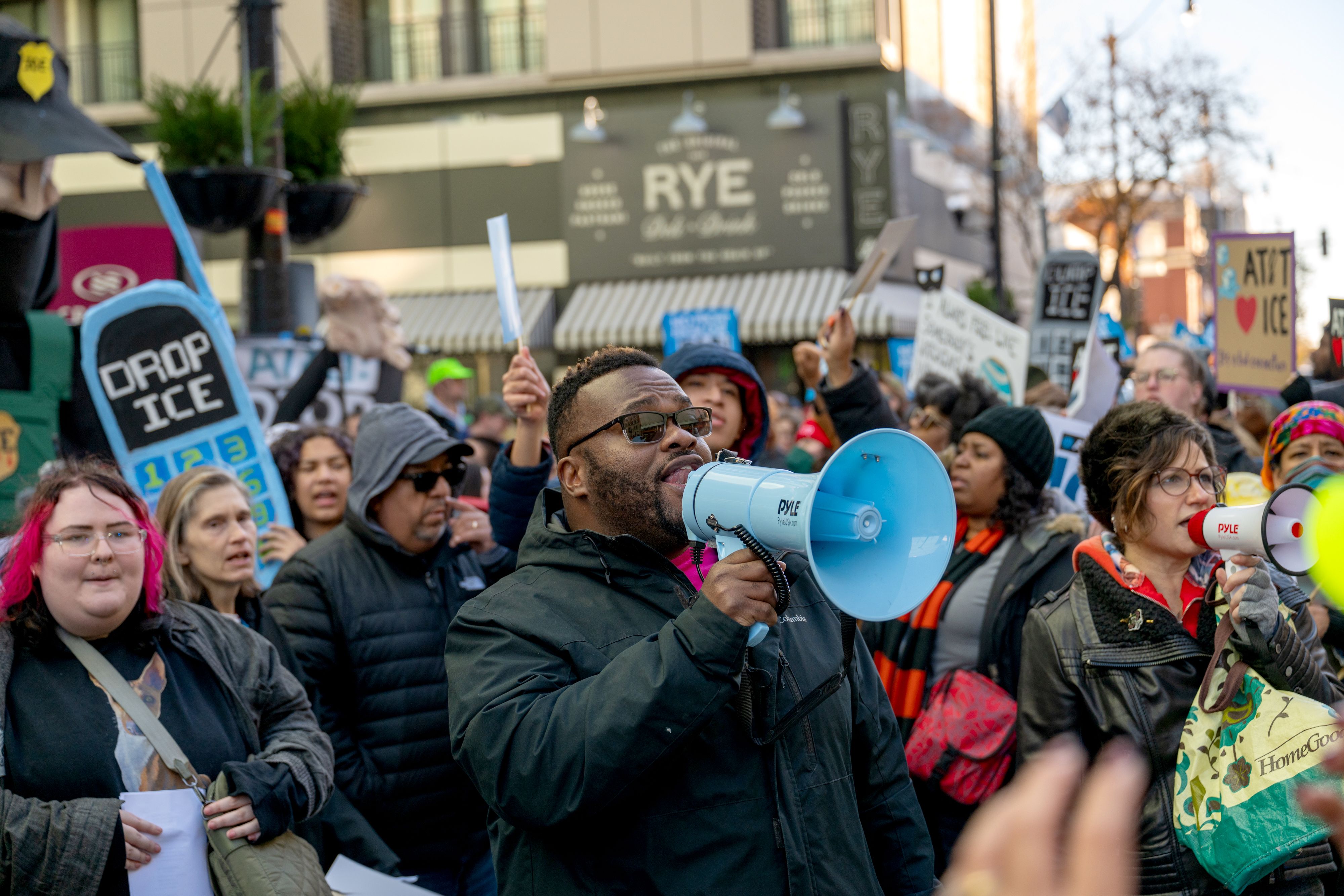 Protesters stage a rally at an AT&T store to call on the company to end its business relationship with federal agencies conducting President Donald J. Trump's mass deportation efforts. (Photo by Matthew Rodier/NurPhoto via AP)